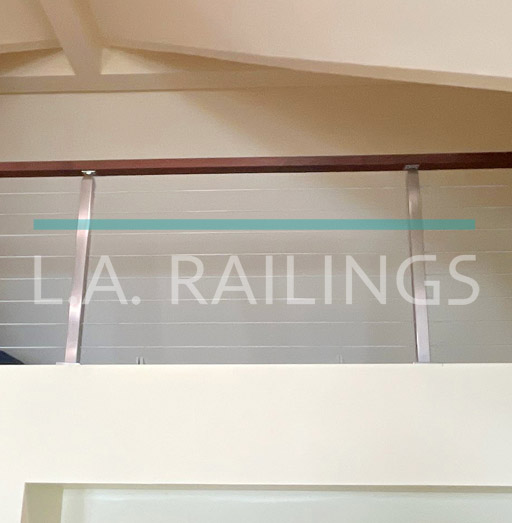 Santa Monica - Residential - A steel cable railing system with wood accents by LA Railings
