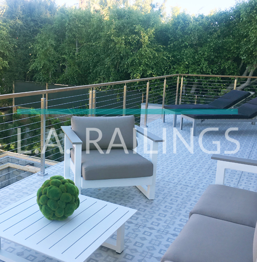 Santa Monica - Residential - A steel cable railing system with wood accents by LA Railings